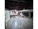 Unfinished basement with concrete floor and workbench at 325 Hunter St, Salisbury, NC 28144