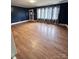 Spacious living area with hardwood floors and blue walls at 325 Hunter St, Salisbury, NC 28144