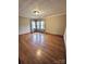 Hardwood floors and large windows in this bright living room at 325 Hunter St, Salisbury, NC 28144