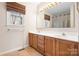 Bathroom with double vanity and tiled floor at 3706 Selwyn Farms Ln # 17-3, Charlotte, NC 28209