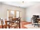 Dining area with hardwood floors and access to backyard at 3706 Selwyn Farms Ln # 17-3, Charlotte, NC 28209