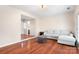 Living room featuring hardwood floors and a light grey sectional sofa at 3706 Selwyn Farms Ln # 17-3, Charlotte, NC 28209