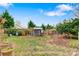 Large backyard with garden, shed, and established plantings at 663 14Th Nw Ave, Hickory, NC 28601