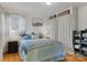 Bright bedroom, featuring a comfy bed and built-in shelving at 663 14Th Nw Ave, Hickory, NC 28601