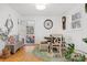 Bright dining area with wood floors and a charming round table at 663 14Th Nw Ave, Hickory, NC 28601