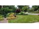 Well-manicured lawn with a fountain and landscaping at 663 14Th Nw Ave, Hickory, NC 28601