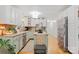 Bright kitchen with island, stainless steel appliances, and green cabinets at 663 14Th Nw Ave, Hickory, NC 28601