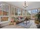 Sunroom featuring wicker furniture and abundant natural light at 663 14Th Nw Ave, Hickory, NC 28601