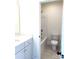 Neutrally-toned bathroom featuring a tub-shower and vanity with quartz countertops at 148 Dabbling Duck Cir, Mooresville, NC 28117
