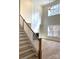 Bright living room with soaring ceilings, a modern fireplace, and large windows at 148 Dabbling Duck Cir, Mooresville, NC 28117