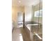 Modern main bathroom featuring a glass shower, soaking tub and an open doorway to the bedroom at 148 Dabbling Duck Cir, Mooresville, NC 28117