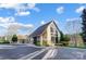 Community clubhouse featuring stone accents and ample parking at 2315 Smith Harbour Dr, Denver, NC 28037