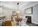 Formal dining room featuring decorative lighting, fireplace and large windows providing great natural light at 2315 Smith Harbour Dr, Denver, NC 28037