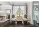 Inviting foyer features hardwood floors, large windows and decoratively adorned seating area at 2315 Smith Harbour Dr, Denver, NC 28037