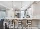 Bright eat-in kitchen features stainless steel appliances, white cabinets, subway tile, and pendant lighting at 2315 Smith Harbour Dr, Denver, NC 28037