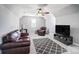Living room with a large rug, comfortable seating, and natural light at 2315 Smith Harbour Dr, Denver, NC 28037