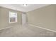 Spacious bedroom with neutral walls and carpet flooring at 2471 Palmdale Walk Dr # 107, Fort Mill, SC 29708