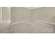 Simple bedroom with plush carpet at 2471 Palmdale Walk Dr # 107, Fort Mill, SC 29708