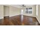 Bright living room with hardwood floors and door leading to backyard at 2471 Palmdale Walk Dr # 107, Fort Mill, SC 29708