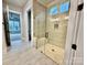 Elegant bathroom featuring a glass shower enclosure and updated tile at 2971 Alveston Nw Dr # 29, Concord, NC 28027