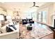 Inviting open-concept living space with a fireplace, hardwood floors, and modern decor at 2971 Alveston Nw Dr # 29, Concord, NC 28027