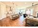 Spacious living area with an open-concept design, combining the kitchen, dining, and living spaces at 2971 Alveston Nw Dr # 29, Concord, NC 28027