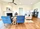 Cozy living area with a fireplace, comfortable seating, and ample natural light creating a welcoming atmosphere at 2971 Alveston Nw Dr # 29, Concord, NC 28027