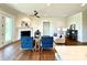 Bright living room with a fireplace, hardwood floors, and access to the outdoor space through double doors at 2971 Alveston Nw Dr # 29, Concord, NC 28027