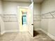 Spacious walk-in closet with ample shelving and natural light at 2971 Alveston Nw Dr # 29, Concord, NC 28027