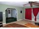 Living room features tiled floors and a view into a sunroom at 5401 Dowgate Dr, Charlotte, NC 28208