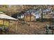 Partially sloped backyard with shed and gazebo at 6334 Dillard Ridge Dr, Charlotte, NC 28216