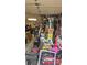 Overstuffed garage with various items and equipment at 6334 Dillard Ridge Dr, Charlotte, NC 28216