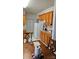 Kitchen features ample wood cabinetry and a refrigerator at 6334 Dillard Ridge Dr, Charlotte, NC 28216