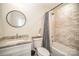 Bathroom with shower/tub combo and granite vanity at 10221 Hanging Moss Trl, Charlotte, NC 28227