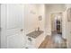 Inviting hallway with built-in bench and storage at 10221 Hanging Moss Trl, Mint Hill, NC 28227