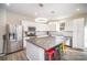 Modern kitchen with stainless steel appliances and island at 10221 Hanging Moss Trl, Mint Hill, NC 28227