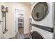 Laundry room with washer, dryer, and storage at 10221 Hanging Moss Trl, Charlotte, NC 28227