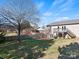 Large backyard with brick patio, perfect for outdoor entertaining and relaxation at 2505 Ashford Dr, Newton, NC 28658