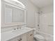 A bathroom with white vanity and a white tub with chrome shower fixture at 2505 Ashford Dr, Newton, NC 28658