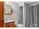 Bathroom with wooden vanity, toilet and shower at 4264 C & B Farm Rd, Conover, NC 28613