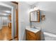 Small bathroom with wooden vanity and medicine cabinet at 4264 C & B Farm Rd, Conover, NC 28613