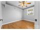 Bedroom with hardwood floors, ceiling fan and window at 4264 C & B Farm Rd, Conover, NC 28613