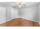 Spacious bedroom featuring hardwood floors and double closets at 4264 C & B Farm Rd, Conover, NC 28613