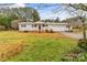 Ranch home features a covered porch and attached garage at 4264 C & B Farm Rd, Conover, NC 28613