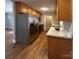 Stainless steel appliances and wood cabinets in kitchen at 4264 C & B Farm Rd, Conover, NC 28613