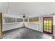 Relaxing screened porch with ceiling fan and access to backyard at 4264 C & B Farm Rd, Conover, NC 28613