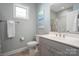 Clean bathroom, double vanity, and shower/tub combo at 4779 Looking Glass Trl, Denver, NC 28037