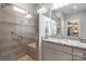 Bathroom with walk in shower, granite vanity, and linen closet at 4779 Looking Glass Trl, Denver, NC 28037