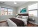 Spacious bedroom with large window and stylish decor at 4779 Looking Glass Trl, Denver, NC 28037