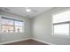 Bright bedroom with two windows and hardwood floors at 4779 Looking Glass Trl, Denver, NC 28037